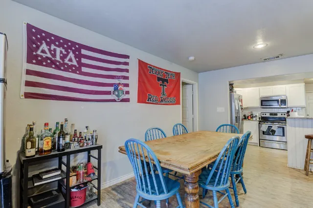 a view of a dining room with furniture