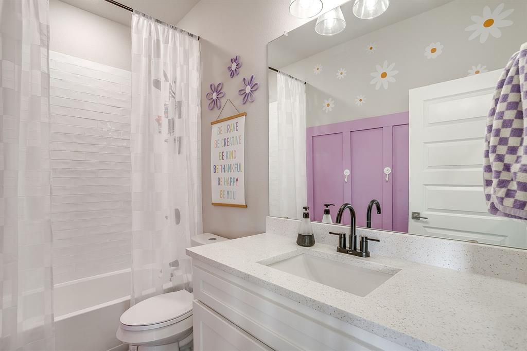 9720 Scenic View Court Rio Vista, TX 76093 - Photo 21 of 31 a bathroom with a granite countertop sink toilet and shower