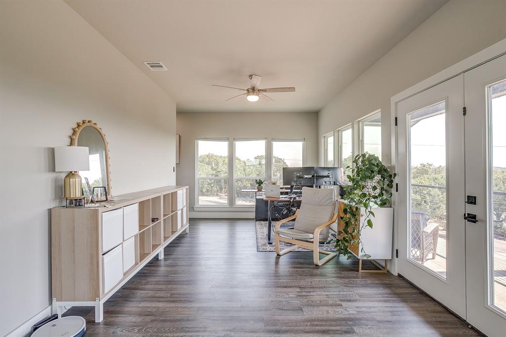 9720 Scenic View Court Rio Vista, TX 76093 - Photo 25 of 31 a living room with furniture and a large window