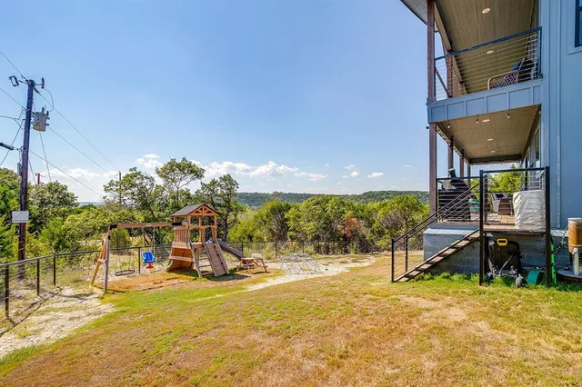 a view of a city with a building in the background