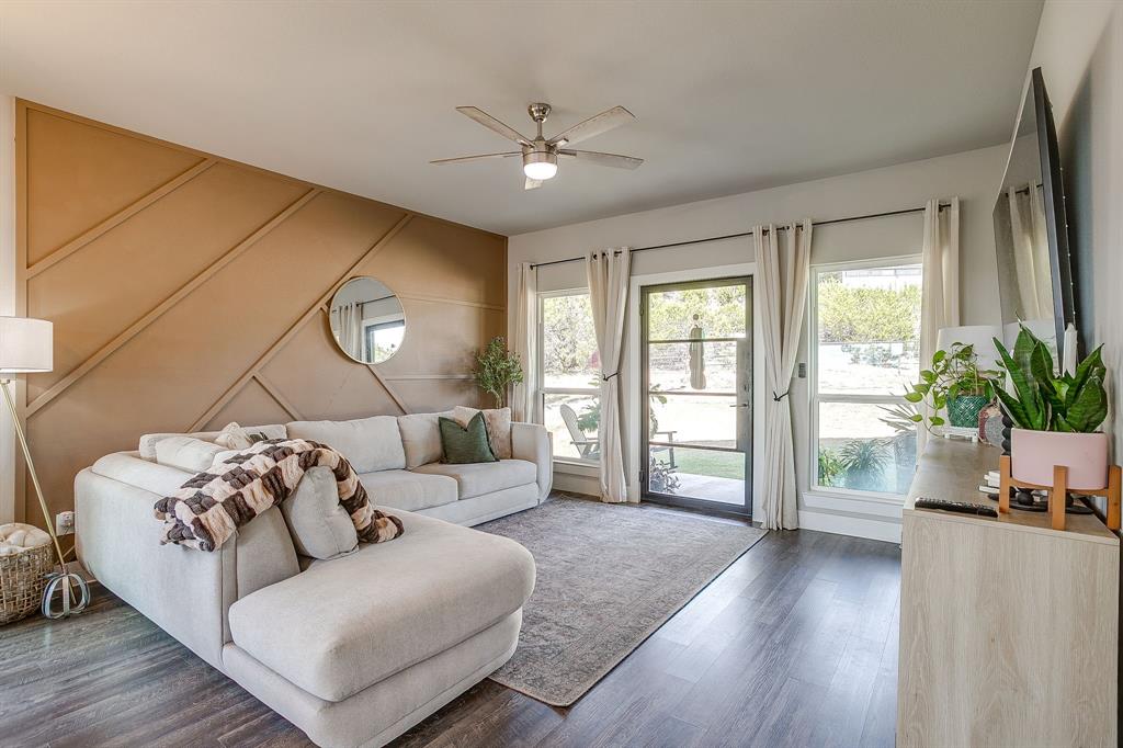 9720 Scenic View Court Rio Vista, TX 76093 - Photo 5 of 31 a living room with furniture and a large window