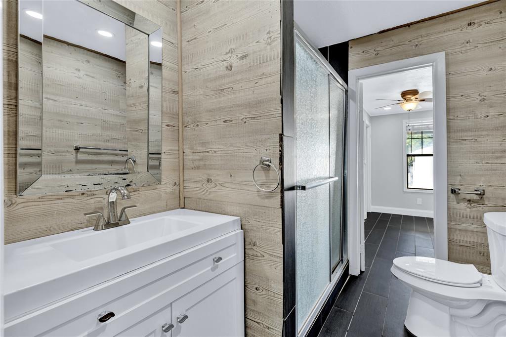 4120 Fry Street Fort Worth, TX 76115 - Photo 16 of 29 Bathroom featuring vanity, a shower stall, and recessed lighting