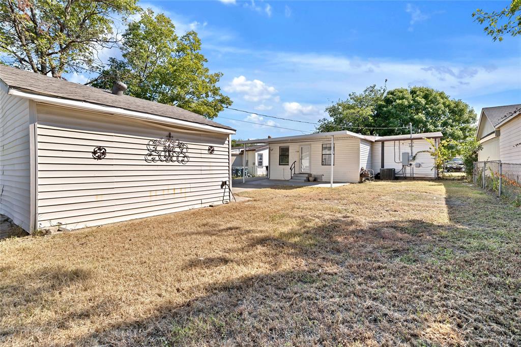4120 Fry Street Fort Worth, TX 76115 - Photo 20 of 29 Rear view of house with a patio