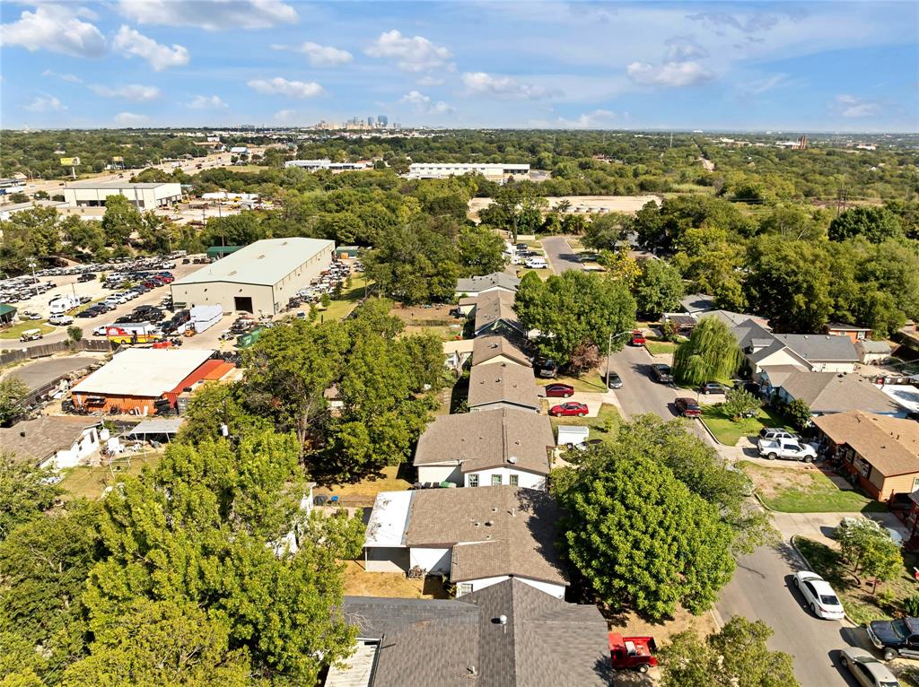 4120 Fry Street Fort Worth, TX 76115 - Photo 24 of 29 Aerial view of residential area with a tree filled landscape