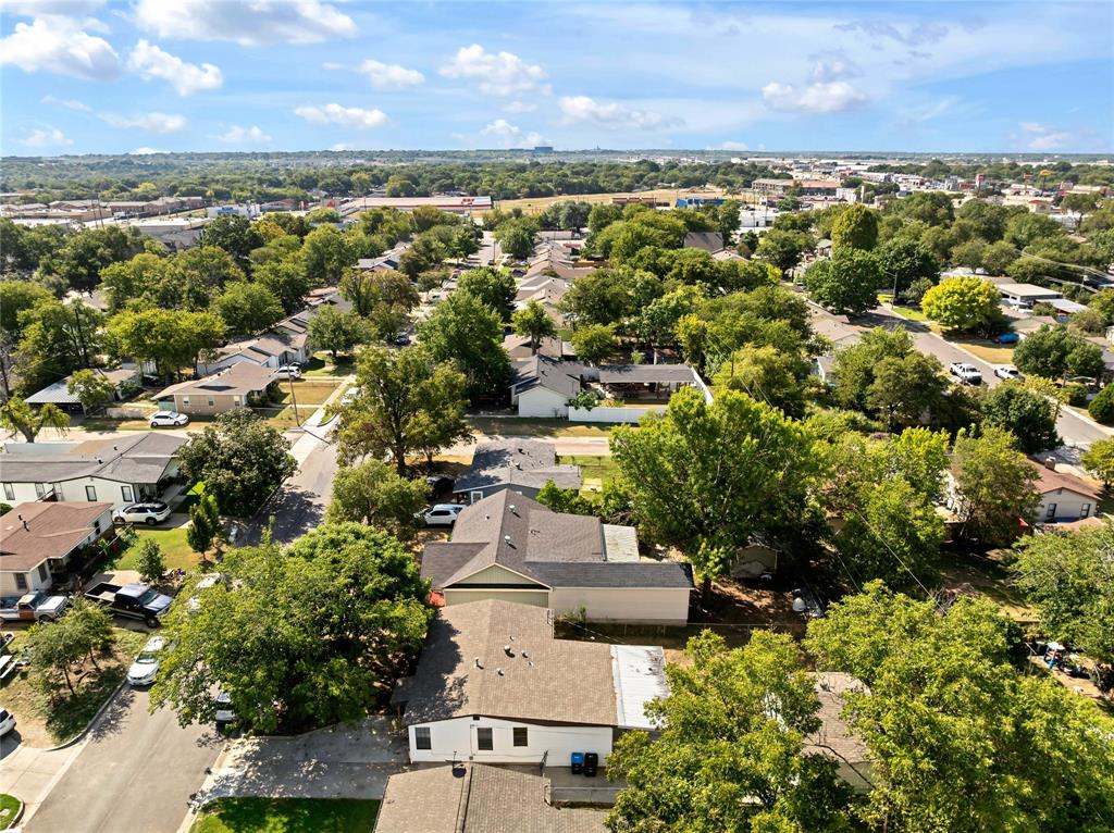 4120 Fry Street Fort Worth, TX 76115 - Photo 26 of 29 Aerial perspective of suburban area with a tree filled landscape