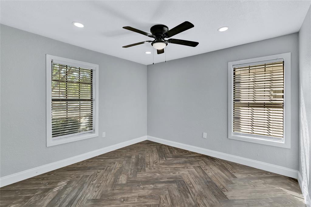 4120 Fry Street Fort Worth, TX 76115 - Photo 4 of 29 Empty room with recessed lighting and ceiling fan
