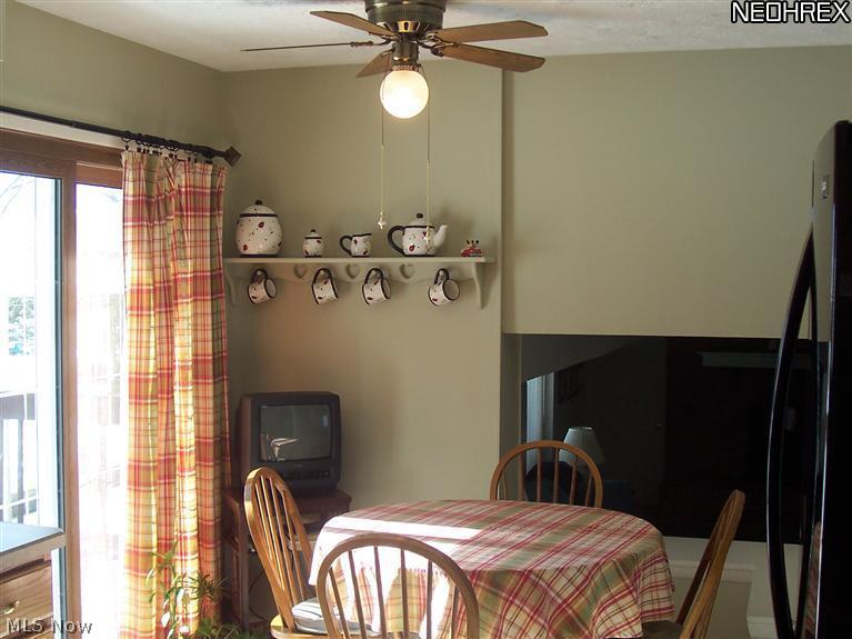 Dinette leads to deck and covered patio.