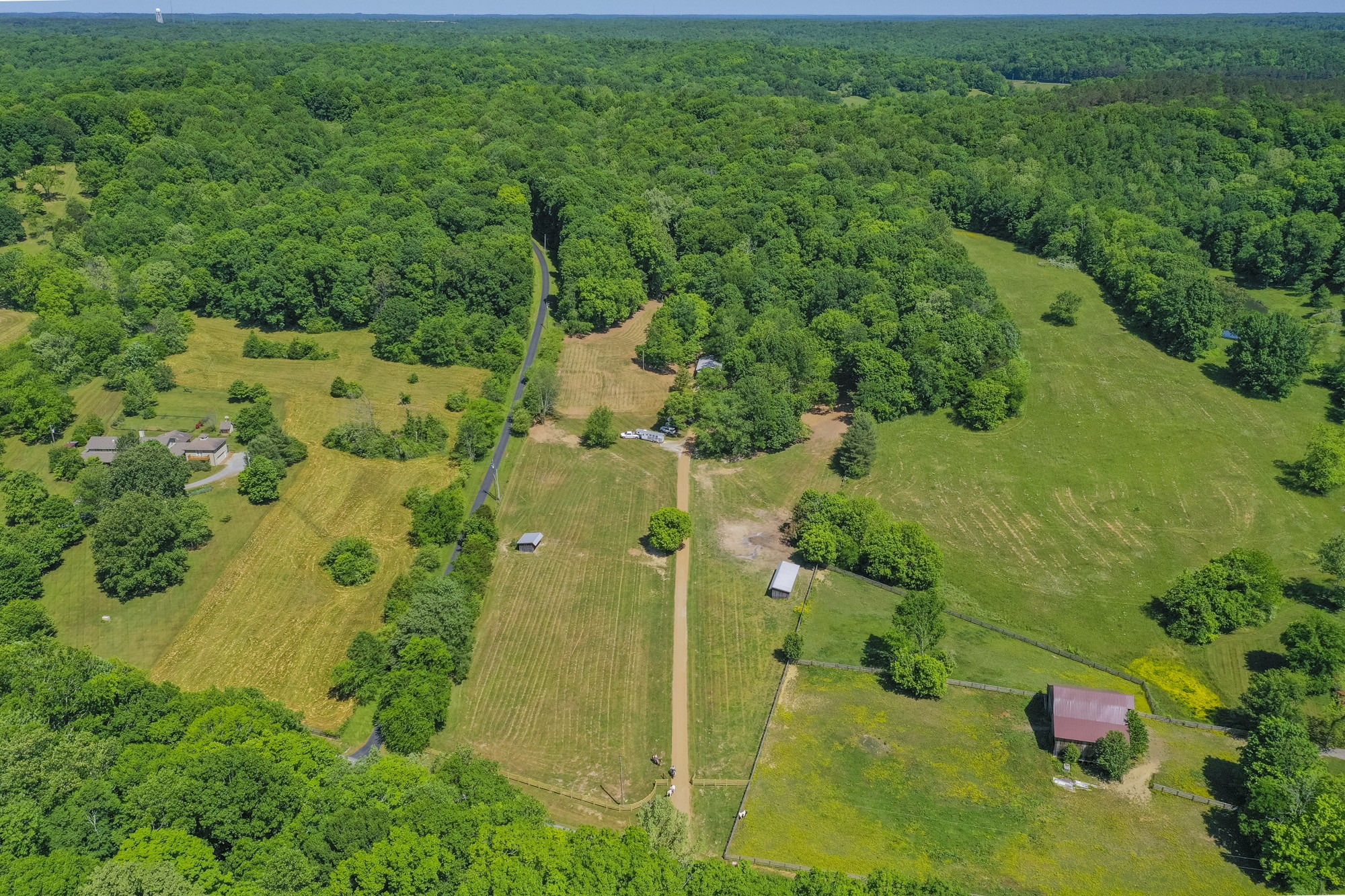 5750 Davis Hollow Road Franklin, TN 37064 - Photo 1 of 41 an aerial view of residential house with an outdoor space and seating