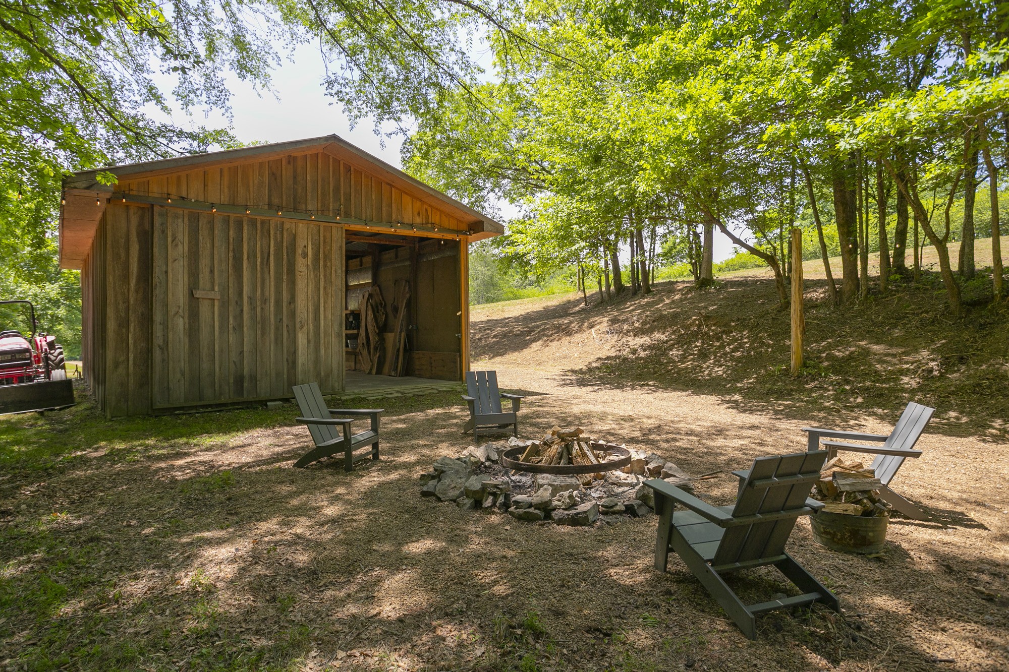 5750 Davis Hollow Road Franklin, TN 37064 - Photo 27 of 41 a backyard of a house with table and chairs