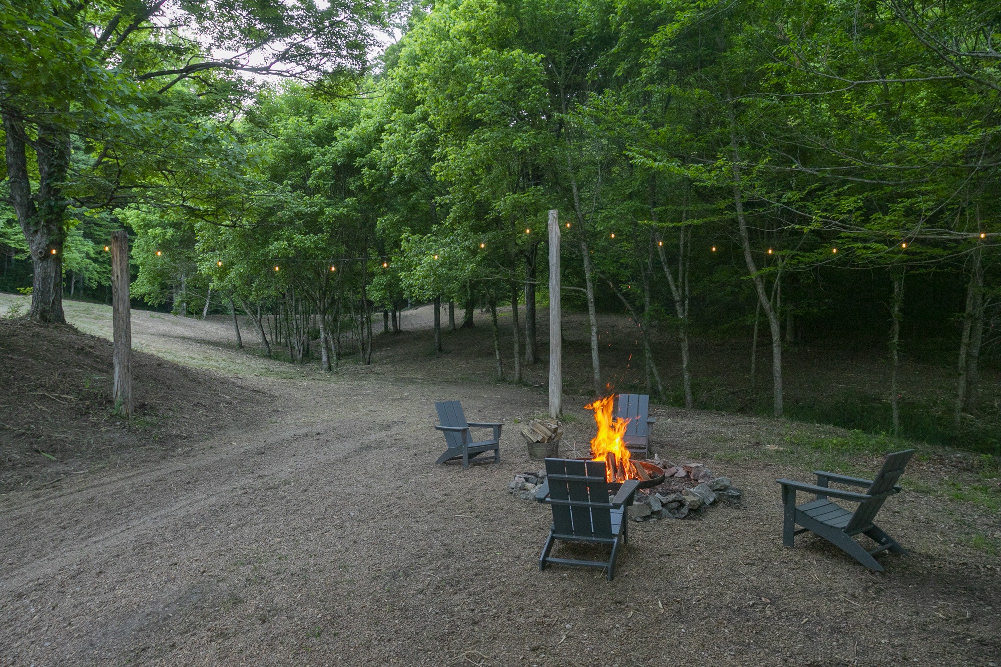 5750 Davis Hollow Road Franklin, TN 37064 - Photo 33 of 41 a backyard of a house with fountain table and chairs
