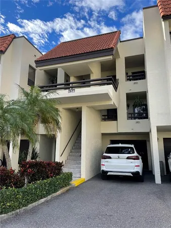 a car parked in front of a house