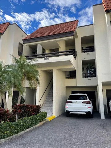 a car parked in front of a house