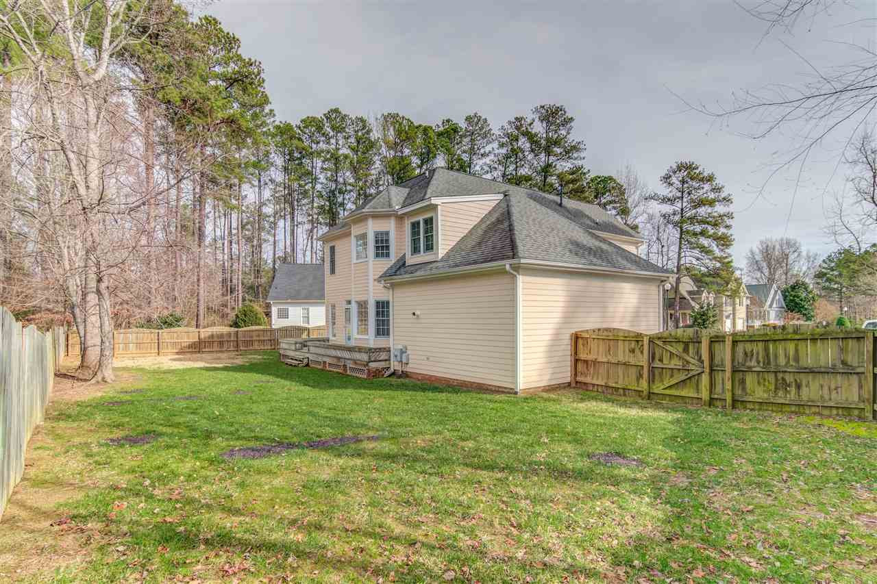 2401 Carruthers Court Raleigh, NC 27615 - Photo 23 of 25 Fenced Yard & Deck