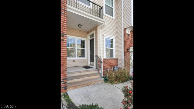 a view of a house with a street view