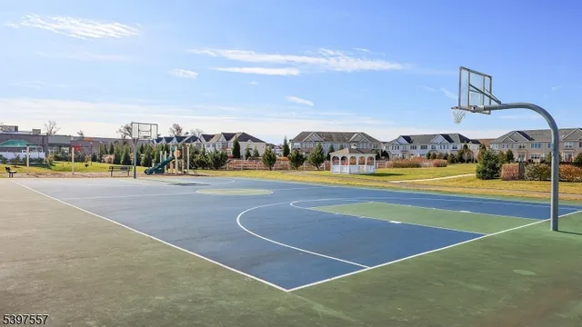 a view of an outdoor space and tennis court