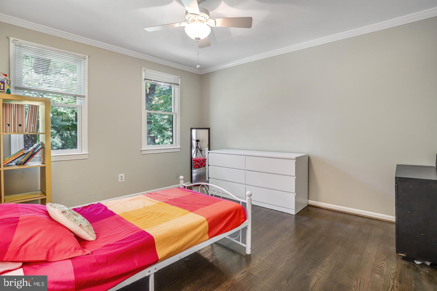 931 Welham Green Road Great Falls, VA 22066 - Photo 49 of 75 a bedroom with a bed and wooden floor