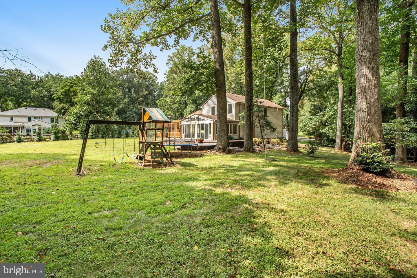 931 Welham Green Road Great Falls, VA 22066 - Photo 66 of 75 a view of a park with swings