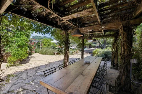 a view of backyard with green space