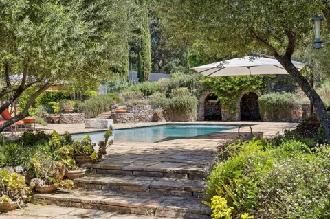 a backyard of a house with lots of green space