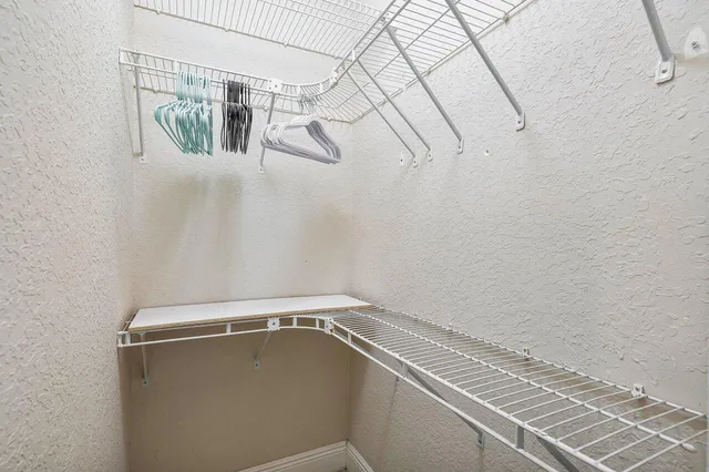 a view of a room with racks on the wall