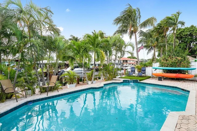 a view of swimming pool from a balcony