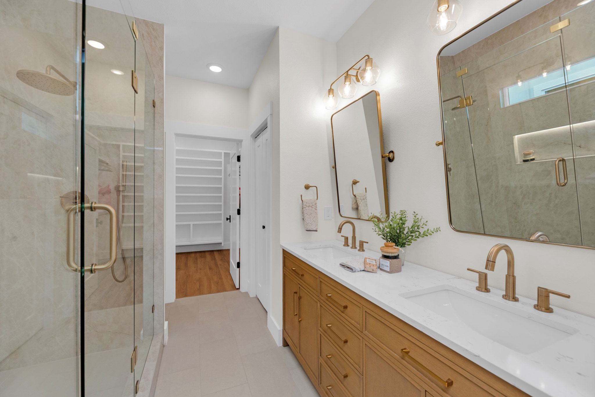 2102 South Church Street Georgetown, TX 78626 - Photo 12 of 40 Double vanity, double shower system with LED niche lighting
Fully skirted Kohler toilet with elongated bowl.