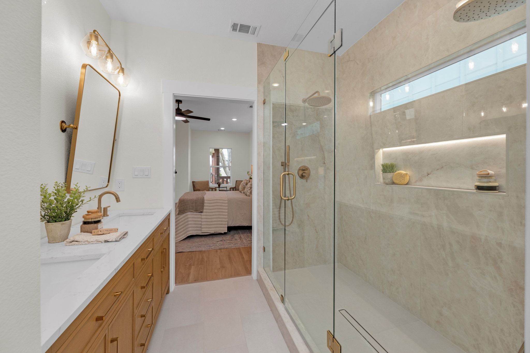 2102 South Church Street Georgetown, TX 78626 - Photo 13 of 40 Ensuite bathroom featuring double vanity, double stall shower, with LED niche lighting