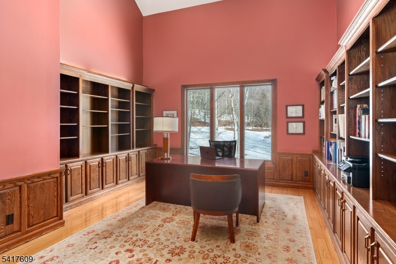 2 Cobblefield Road Mendham, NJ 07945 - Photo 20 of 50 a living room with furniture and a flat screen tv