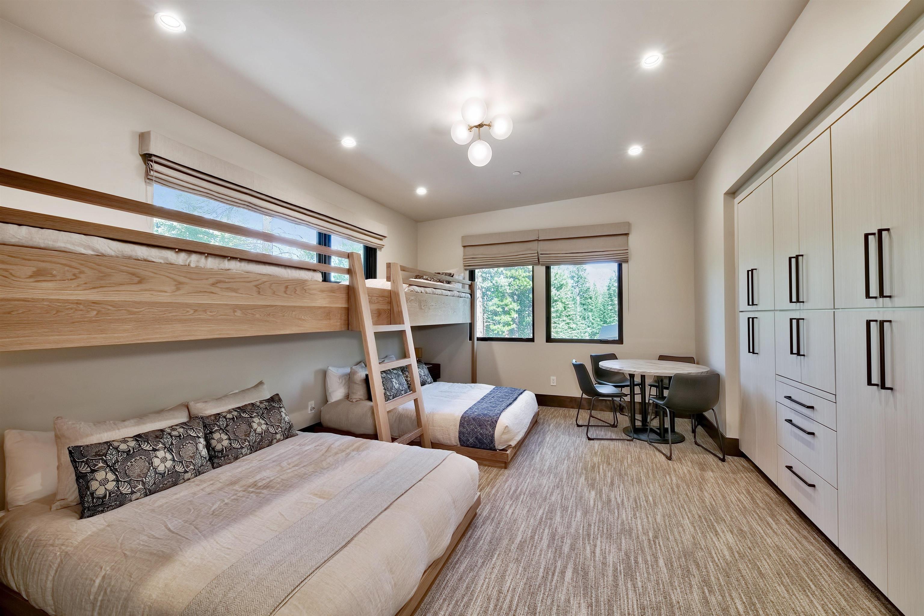 608 Ej Brickell Truckee, CA 96161 - Photo 11 of 20 a bedroom with two beds and a large window