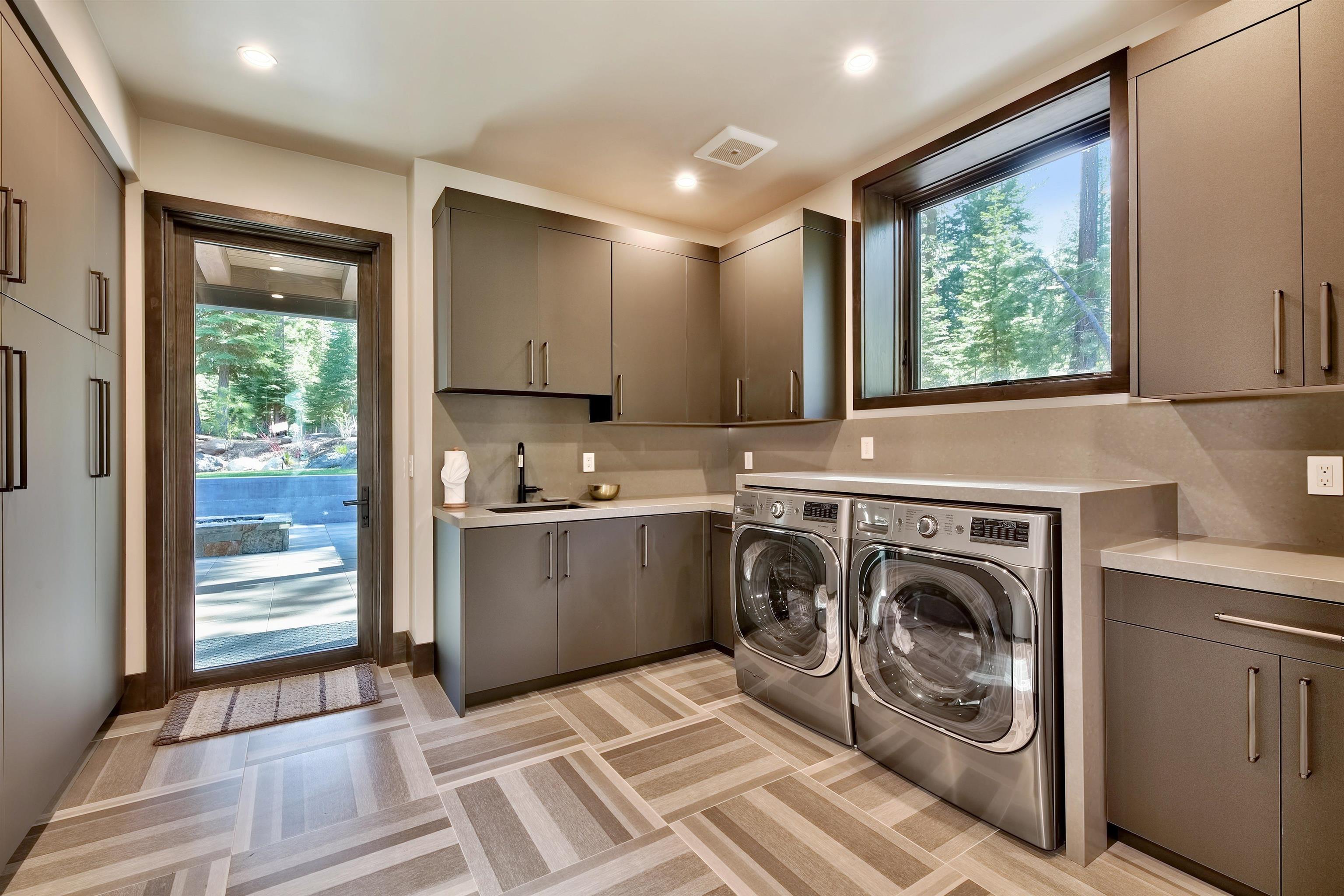 608 Ej Brickell Truckee, CA 96161 - Photo 15 of 20 a kitchen with a refrigerator and window