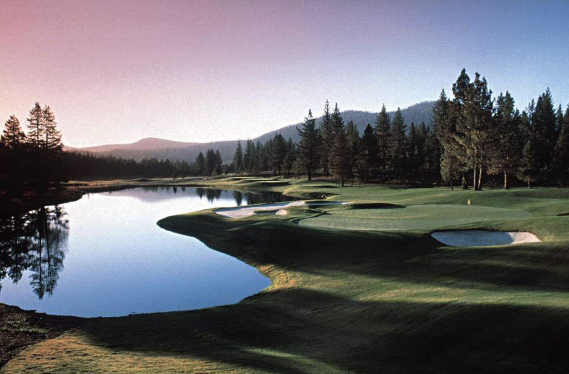608 Ej Brickell Truckee, CA 96161 - Photo 19 of 20 a view of a lake with houses in the back
