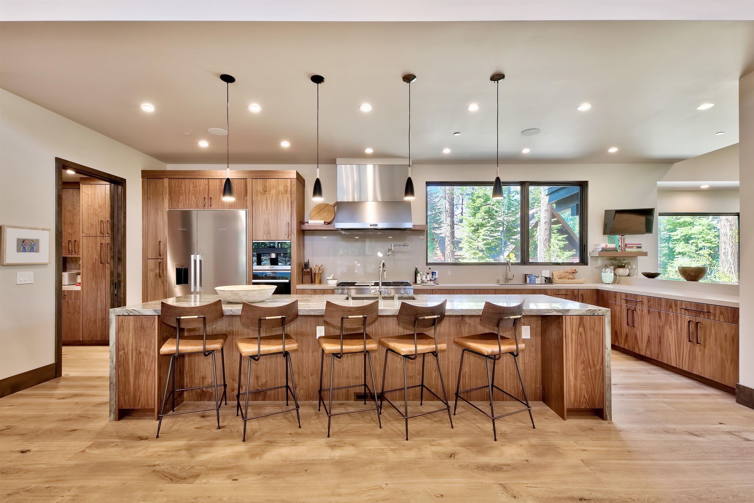 608 Ej Brickell Truckee, CA 96161 - Photo 4 of 20 a large kitchen with lots of furniture and appliances