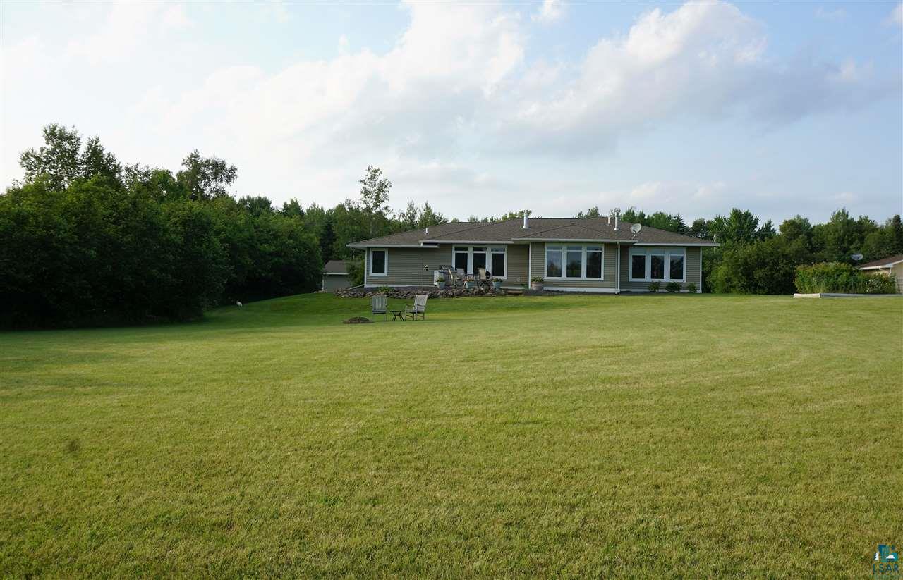 5222 Maple Grove Road Hermantown, MN 55811 - Photo 2 of 24 Groomed Back yard with Firepit..