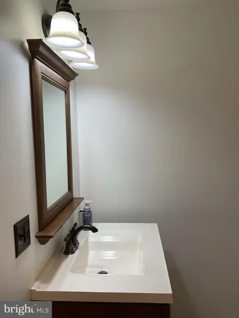 a bathroom with a sink and a toilet