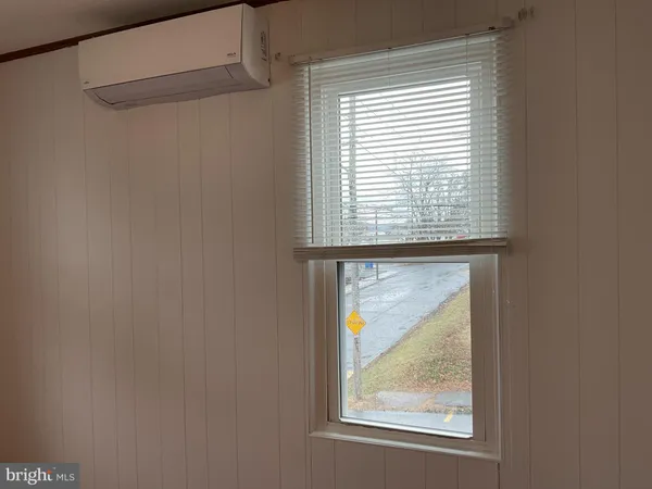 a view of room with gym equipment