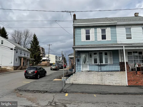 a view of a street with houses