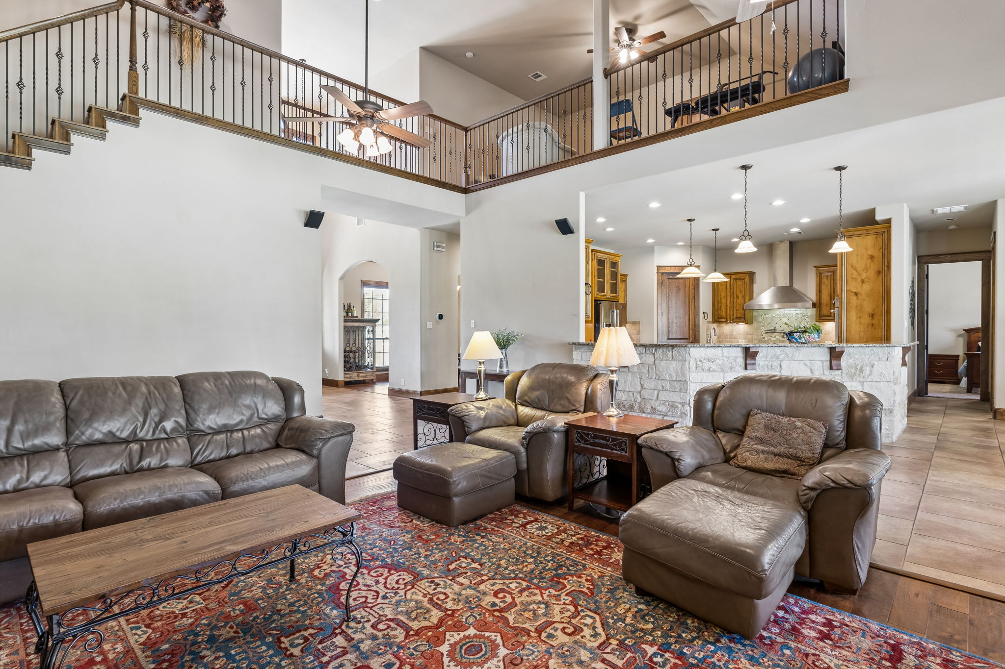 438 Patricia Road Georgetown, TX 78628 - Photo 9 of 36 Soaring ceilings lead to the upstairs loft.