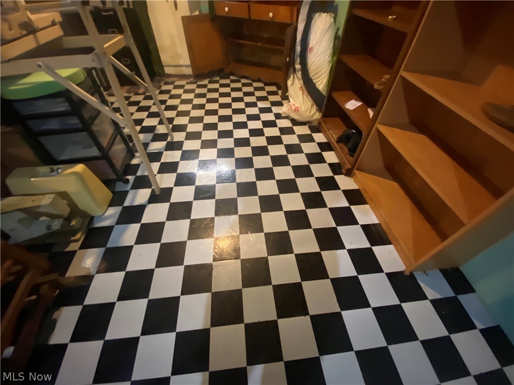 2445 South Elyria Road Wooster, OH 44691 - Photo 30 of 46 Basement featuring patterned floors
