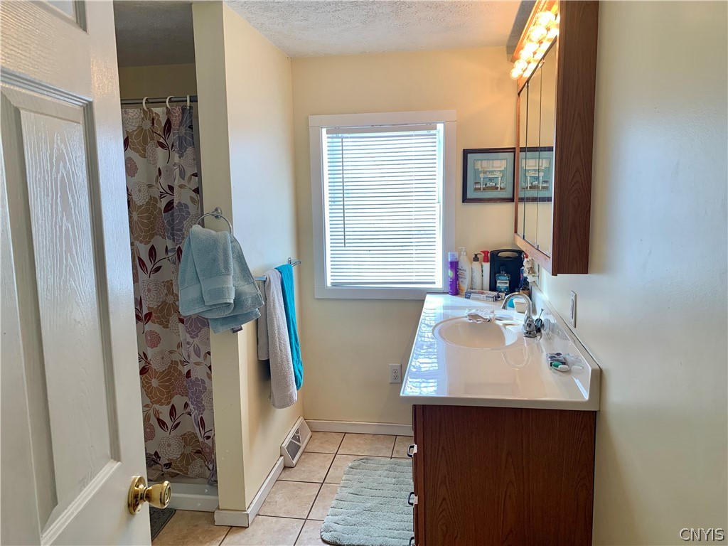 3403 Burke Road Vernon Center, NY 13477 - Photo 19 of 42 The full bath was remodeled the same time as the kitchen.