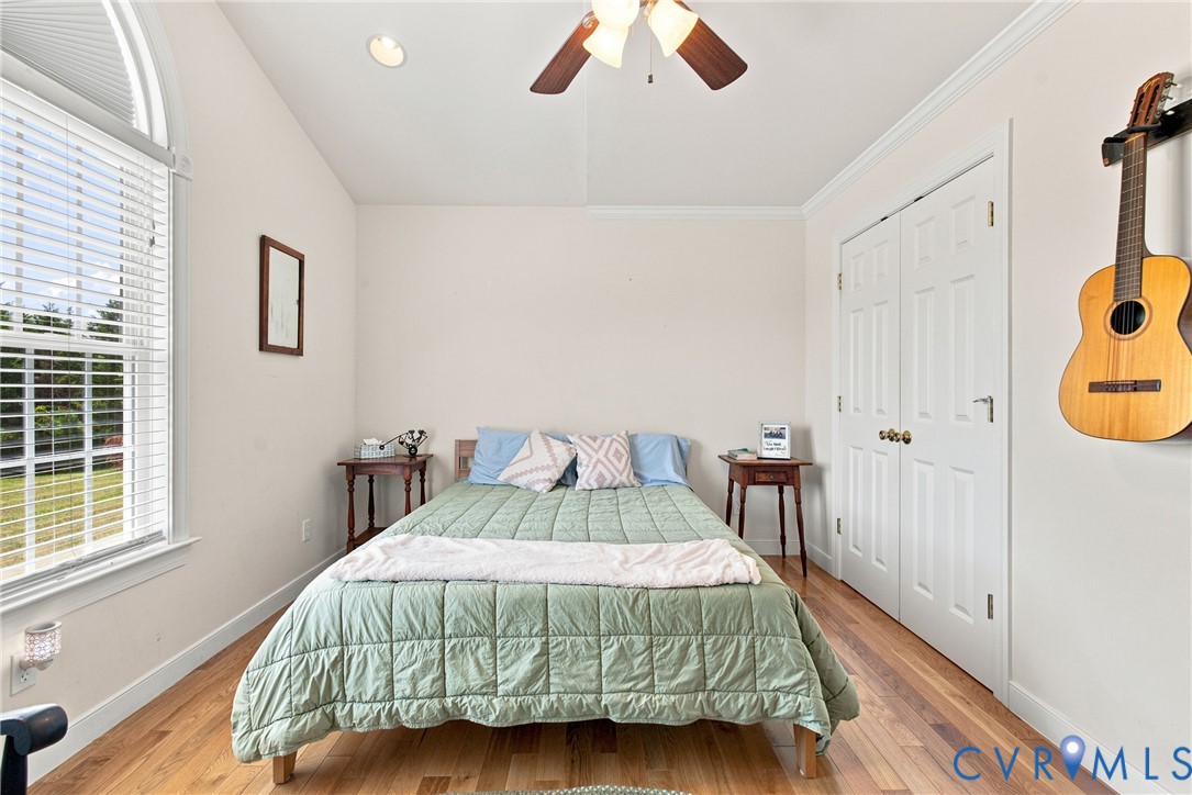 197 Goshen Road Cumberland, VA 23040 - Photo 38 of 70 Room featuring a vaulted ceiling with a ceiling fa