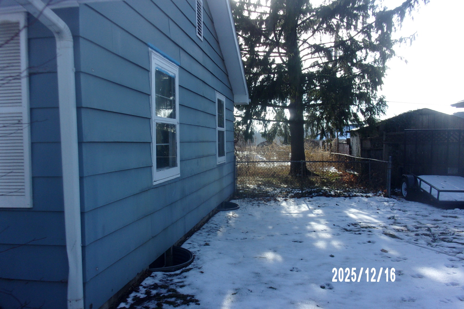 3218 Old Waldron Road Kankakee, IL 60901 - Photo 3 of 4 a view of backyard and wooden fence