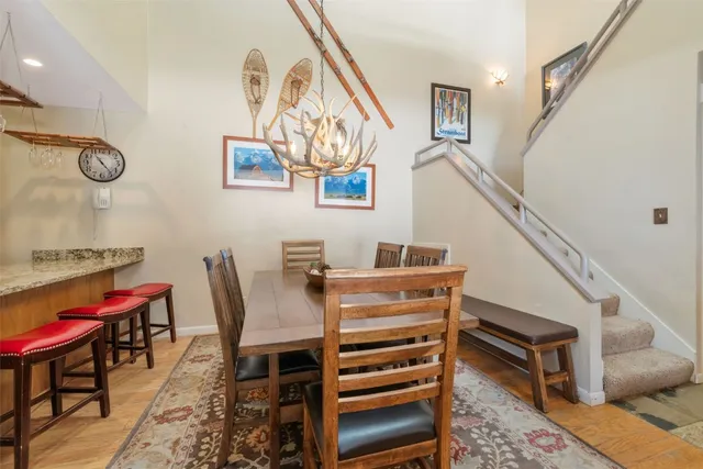 a view of a livingroom with furniture and a piano