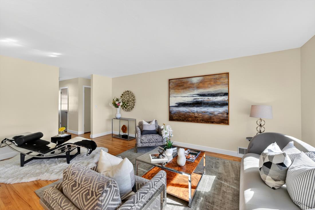 2991-2987 Almaden Road San Jose, CA 95125 - Photo 11 of 60 a living room with furniture ceiling fan and a rug