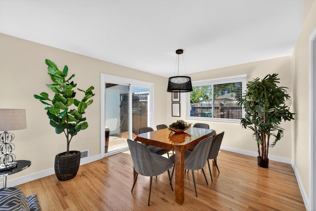 2991-2987 Almaden Road San Jose, CA 95125 - Photo 13 of 60 a dining room with furniture potted plants and wooden floor