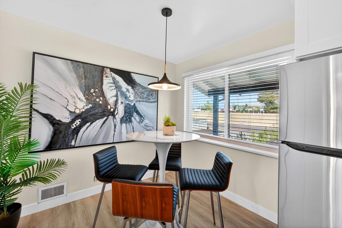 2991-2987 Almaden Road San Jose, CA 95125 - Photo 20 of 60 a view of a dining room with furniture window and wooden floor
