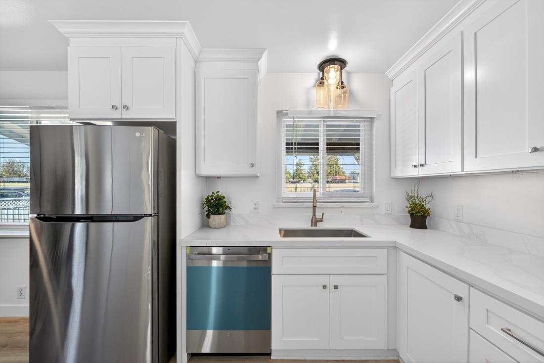 2991-2987 Almaden Road San Jose, CA 95125 - Photo 21 of 60 a kitchen with appliances a sink and a window