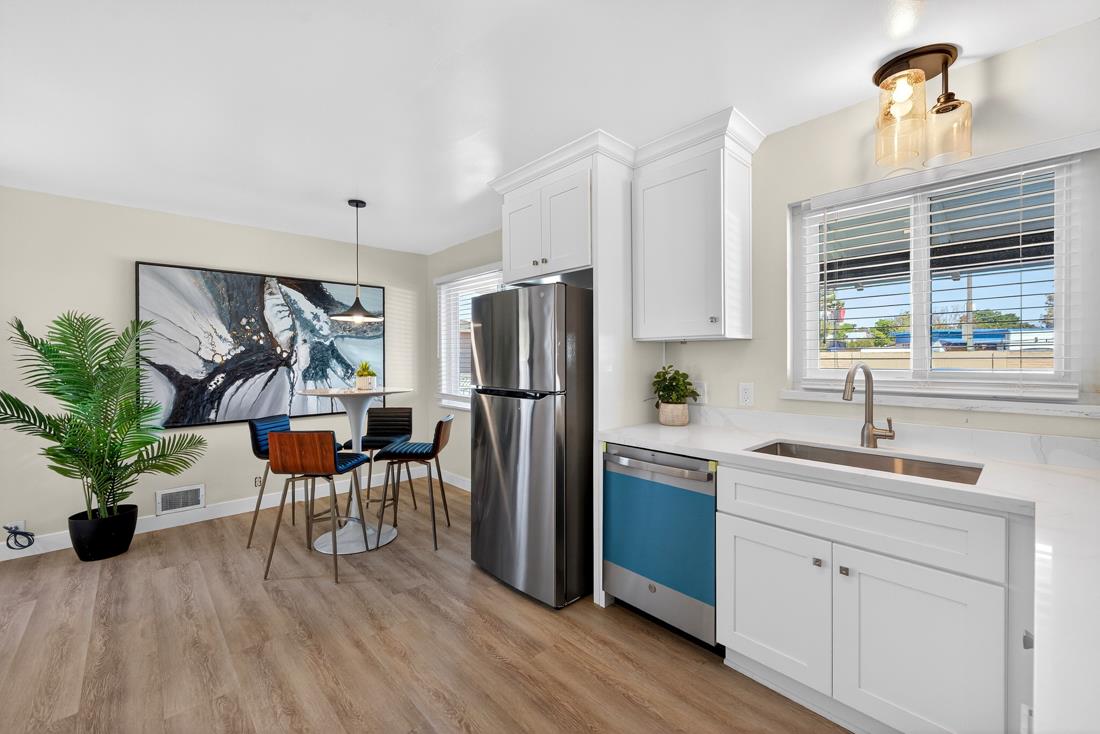 2991-2987 Almaden Road San Jose, CA 95125 - Photo 23 of 60 a kitchen with a refrigerator and a sink