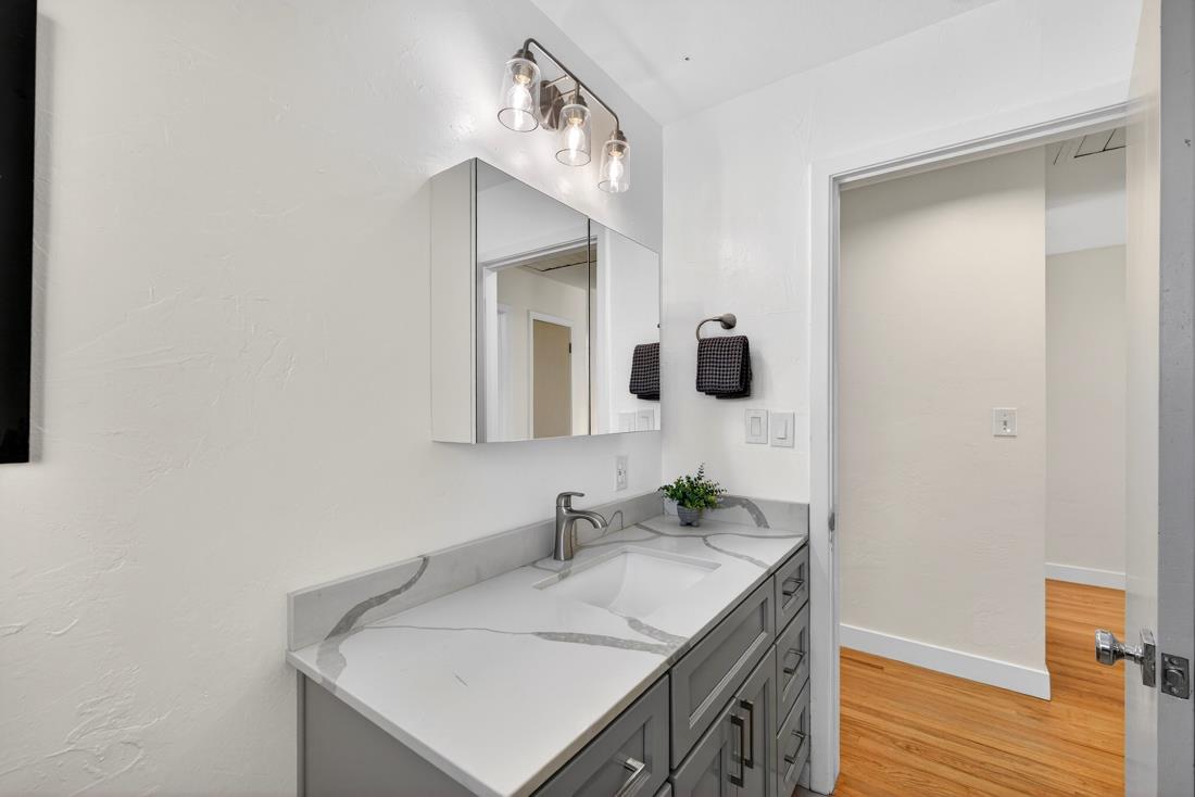 2991-2987 Almaden Road San Jose, CA 95125 - Photo 30 of 60 a bathroom with a sink vanity and a mirror