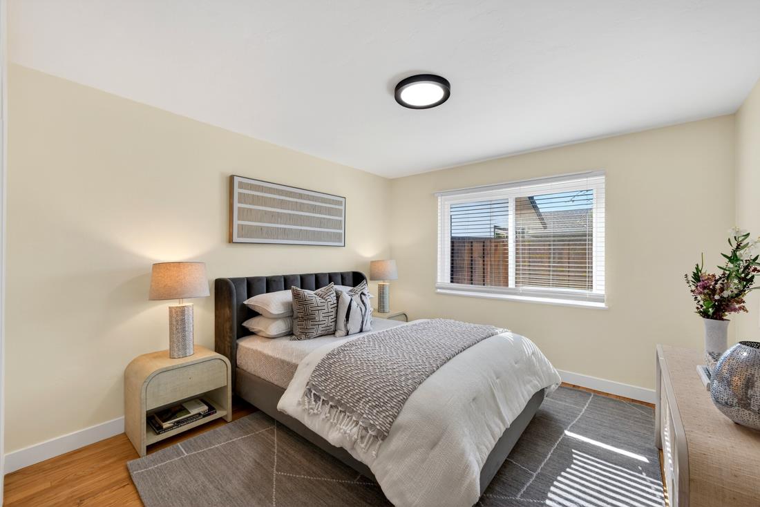 2991-2987 Almaden Road San Jose, CA 95125 - Photo 31 of 60 a bedroom with a bed and wooden floor