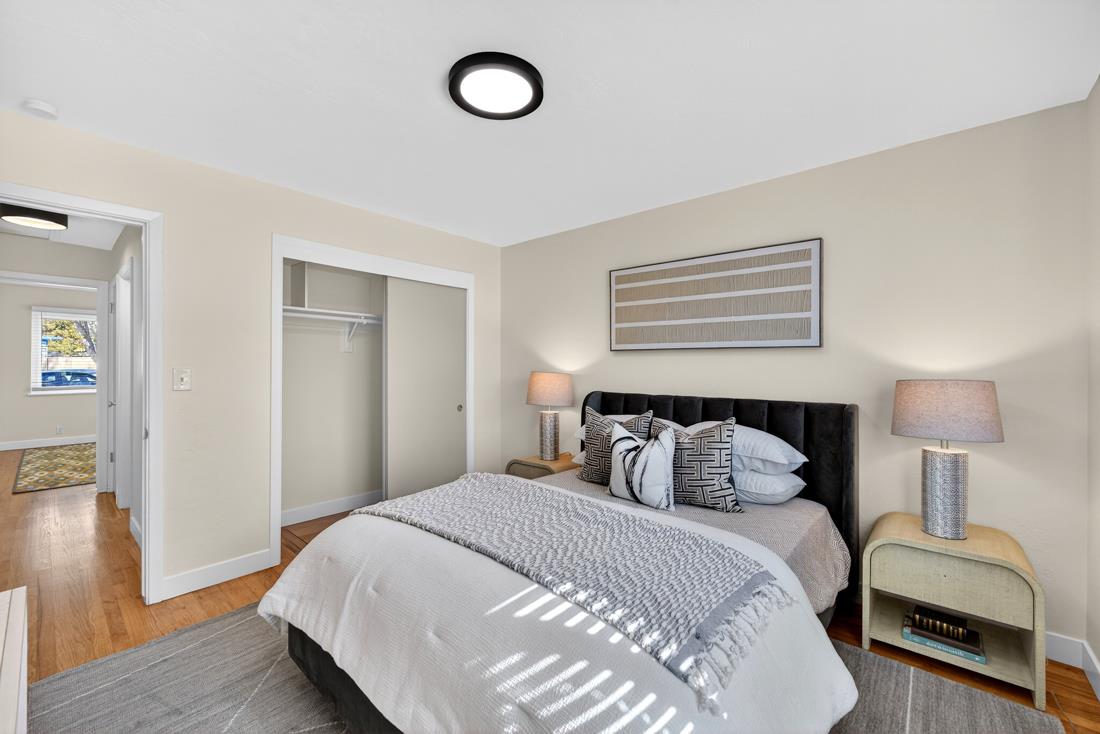 2991-2987 Almaden Road San Jose, CA 95125 - Photo 32 of 60 a bedroom with a bed and wooden floor